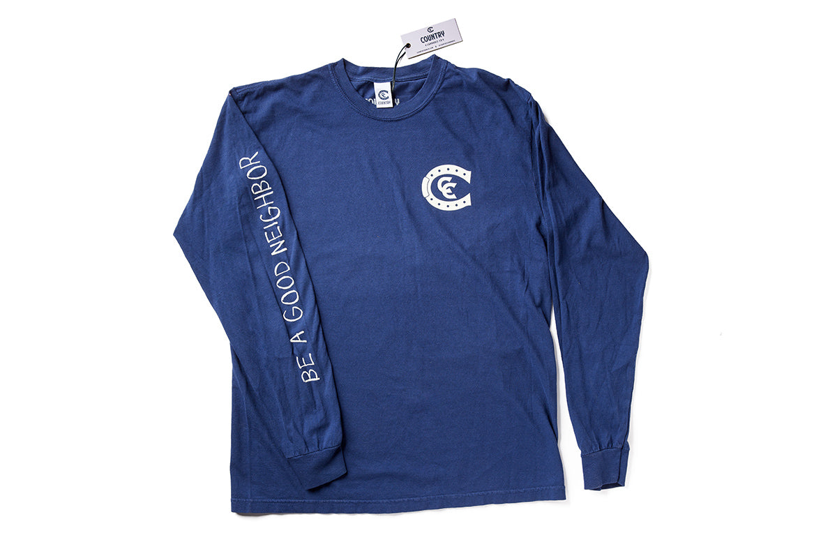Country Cannabis Navy Long Sleeve with white print. White print is Country Cannabis pocket print and Matt McCormick's signature font on the sleeve reminding us to be a good neighbor